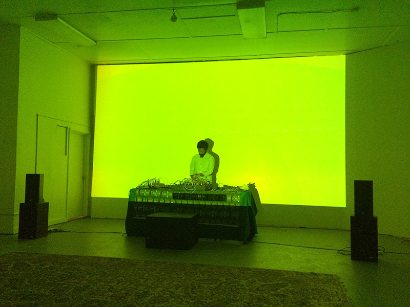 Robert Aiki Aubrey Lowe performing at LAND AND SEA, 2016.