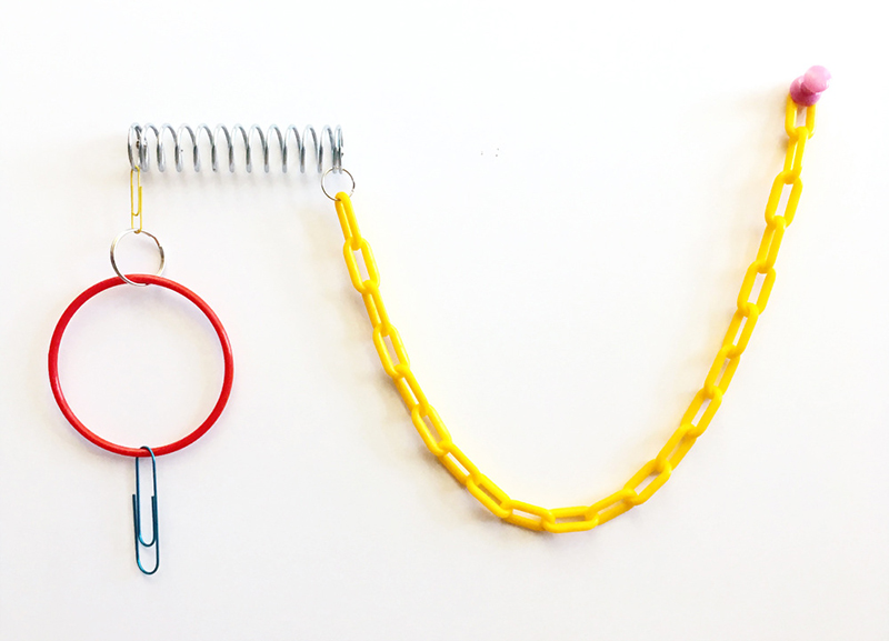 Casual Learning Environment No. 8, 2018; paper clips, metal and plastic rings, metal spring, plastic chain, push pin, 5.75" x 6" x 2.5". All works by Jessalyn Aaland.