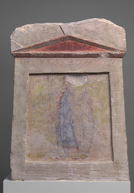 Anonymous, Painted limestone funerary slab with a soldier standing at ease, ca. second half of third century BC; Hellenistic, Greek; limestone, paint; Metropolitan Museum of Art, Gift of Darius Ogden Mills, 1904.