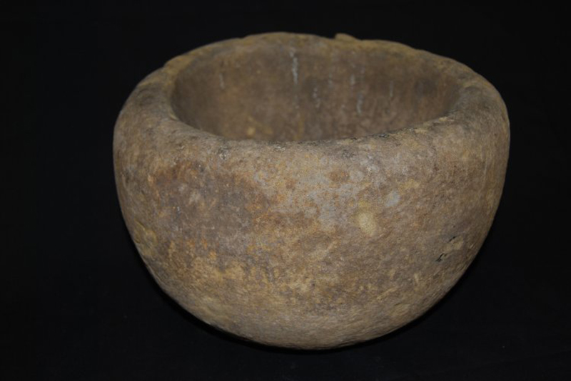 Stone mortar. © Trustees of the British Museum.