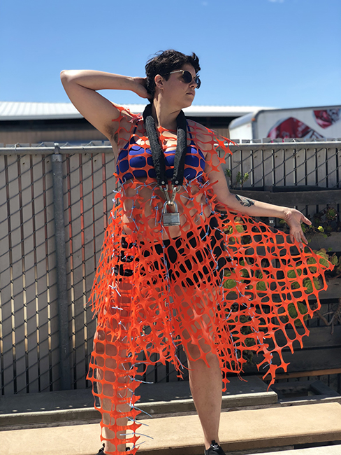 Bonanza, Finish Him! Safety Fence Dress, 2018. Orange safety fence, polypropylene twine, bike chain. Photo by Bonanza.