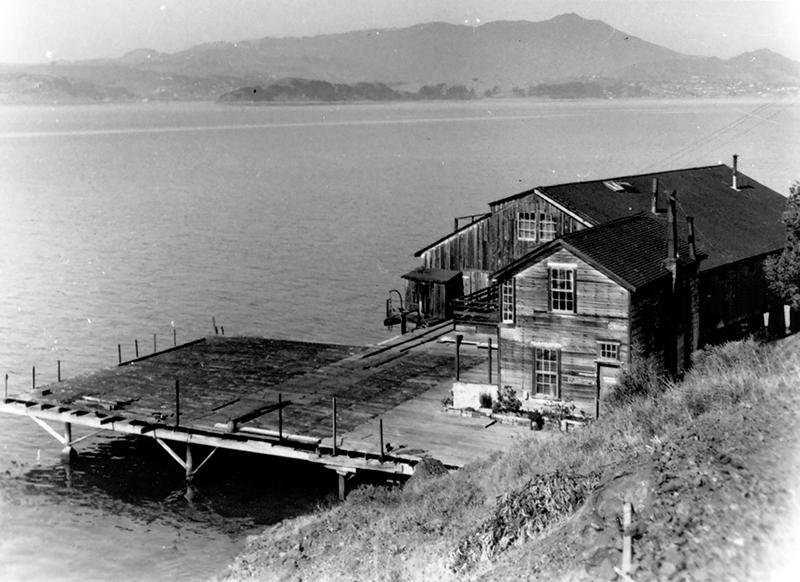 The Codfishery remains at high tide. The bunkhouse is in the foreground. From the Dave Lemon and Jerry O’Day collection, which is housed in the Belvedere-Tiburon Landmarks Society.