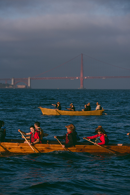 On October 14, 2019, Indigenous Peoples’ Day, eighteen canoes representing dozens of tribes, nations, and communities from as far north as the Klahoose First Nation in British Columbia and as far west as the Kanaka Maoli in Hawai’i took to the waters of San Francisco Bay, circling Alcatraz to reclaim the island as a symbol of Native rights. Photo: Marissa Leshnov.