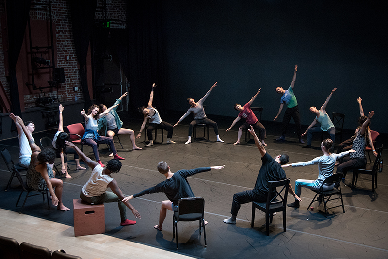 Silas Riener leads the group in a morning warm up. All photos of Signals from the West artist residency by Hillary Goidell.