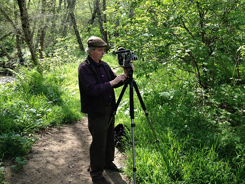 Jerome Hiler in the woods with his camera and tripod, 2016. Photo: Nathaniel Dorsky.