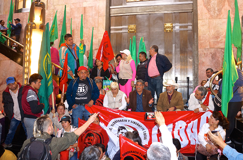 Members of farmworkers associations protest La Revolución at Bellas Artes on December 12, 2019. Photo: Antonio Bertrán.