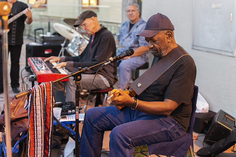 Opening reception of <em>Mike Henderson: Honest to Goodness</em> at San Francisco Art Institute, September 20, 2019. Mike Henderson, guitar; Jerry Long, keyboard; Ed Ramirez, drums; John Rodstad, bass. Photo: Keisha Kidd. Courtesy of San Francisco Art Institute.