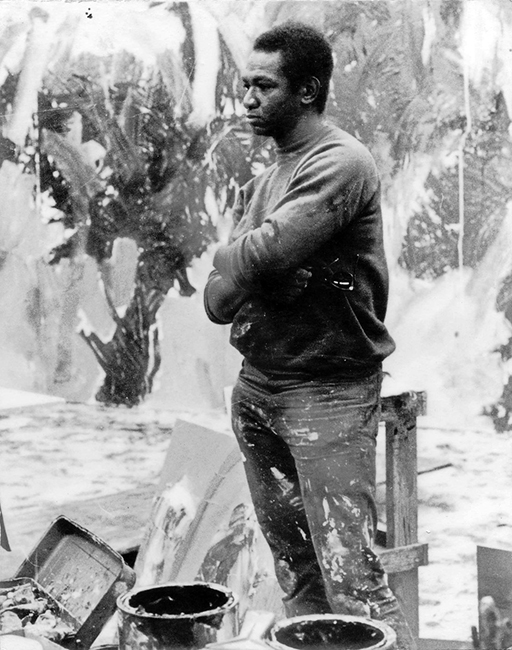 Mike Henderson ca. 1970s. "At the SFAI working on the biggest painting I ever did, during Christmas break. Around about two or three in the morning." Photo: George Auxier.