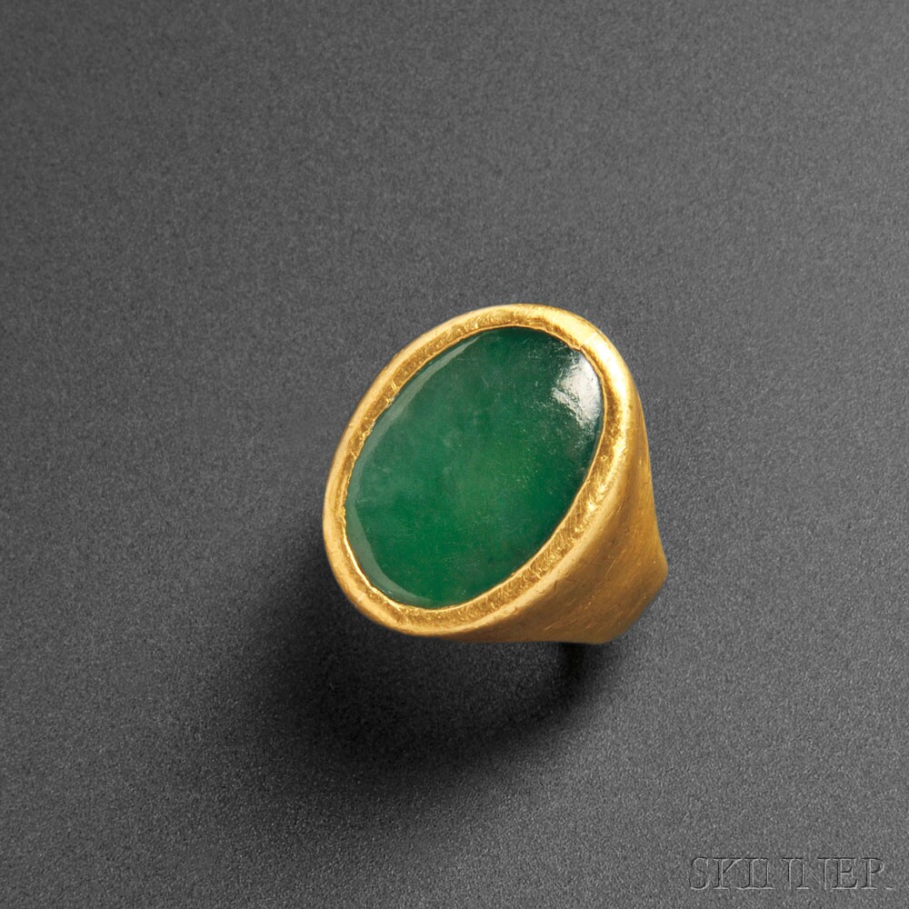 Gold Signet Ring with Cabochon Jadeite Inset, China, 20th century (Lot 471, Estimate $2,000-$3,000)
