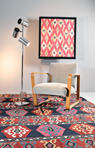 Bentwood chairs and stainless steel floor lamp on late 19th century Caucasian kelim (Lot 69, Estimate $800-$1,000)