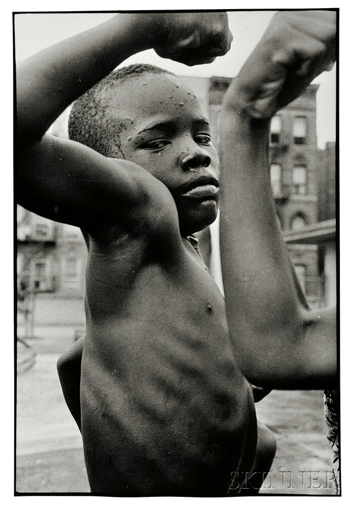 Leonard Freed (American, 1929-2006) Muscle Boy, Harlem, 1963, printed later. (Lot 102, Estimate $1,200-$1,800)