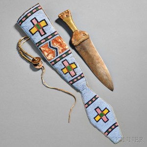 Large Blackfoot Beaded Buffalo Hide Knife Sheath and Double-edged Dag Knife, c. 1870s (Lot 156, Estimate $25,000-$35,000)