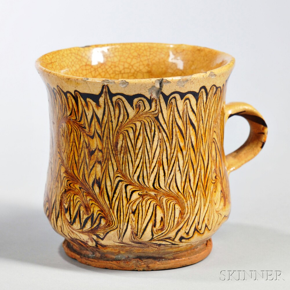 Staffordshire Combed Slipware Drinking Cup, England, c. 1690-1700 (Lot 217, Estimate $2,500-$3,500)