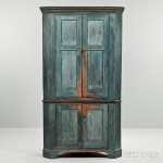 Blue-painted Pine Corner Cupboard, 18th century (Lot 79, Estimate $1,500-2,500)
