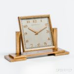 Abercrombie & Fitch Eight-day Brass and Glass Desk Clock, mid-20th century (Estimate: $100-200)