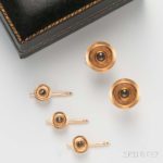 14kt Gold and Smoky Quartz Man's Dress Set, a pair of cuff links and three shirt studs, with ribbed edges and center cabochons, retailed by Bigelow, Kennard Co. (Lot 1100, Estimate: $400-600)