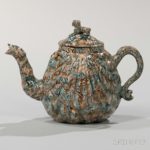 Staffordshire Solid Agate Pecten Shell Teapot and Cover, England, c. 1750 (Lot 33, Estimate $1,000-1,500)