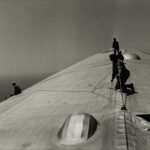Alfred Eisenstaedt (American, 1898-1995) Repairing the Hull of the Graf Zeppelin During the Flight over the Atlantic, 1934 (Lot 98, Estimate $3,000-5,000)