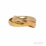18kt Tricolor Gold Trinity Ring, Le Must de Cartier, France (Lot 1024, Estimate $400-600)