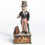 Cast Iron 'Uncle Sam' Mechanical Bank, Shepard Hardware Company, Buffalo, New York, late 19th century, (Lot 1257, Estimate: $800-1,200)