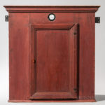 Rare Early Red-painted Pine Hanging Cupboard with Glazed Window and Silver Pocket Watch, 18th century (Lot 28, Estimate: $4,000-$6,000)