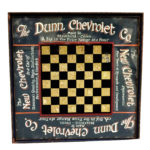 The Dunn Chevrolet Co. Reverse-painted Glass Checkerboards (Lot 21, Estimate: $400-600)