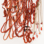 Group of Coral Jewelry, including bead necklaces, bracelets, and carved pendants. (Lot 2007, Estimate: $400-600)