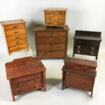 Six Walnut, Maple, and Pine Miniature Bureaus (Lot 227, Estimate: $200-300)