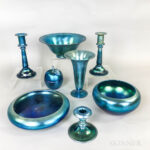 Eight Pieces of Steuben Blue Aurene Iridescent Art Glass (Lot 1032, Estimate: $500-700)
