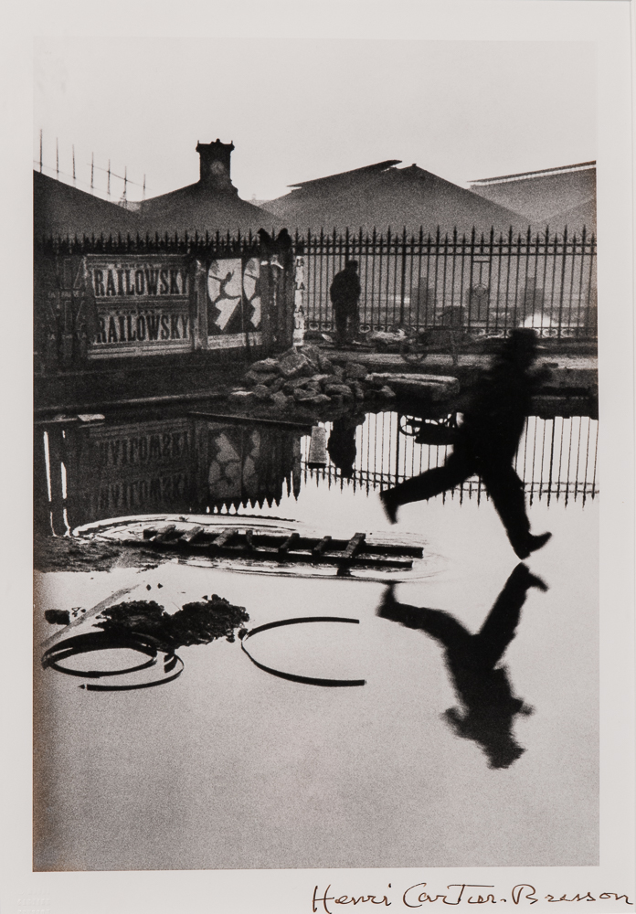 Henri Cartier-Bresson (French, 1908-2004), <i> Behind the Gare St. Lazare</i> (Lot 125, Estimate: $7,000-9,000)