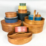 Thirteen Reproduction Shaker Finger Lapped-seam Pantry Boxes and Carriers (Lot 1135, Estimate: $200-300)