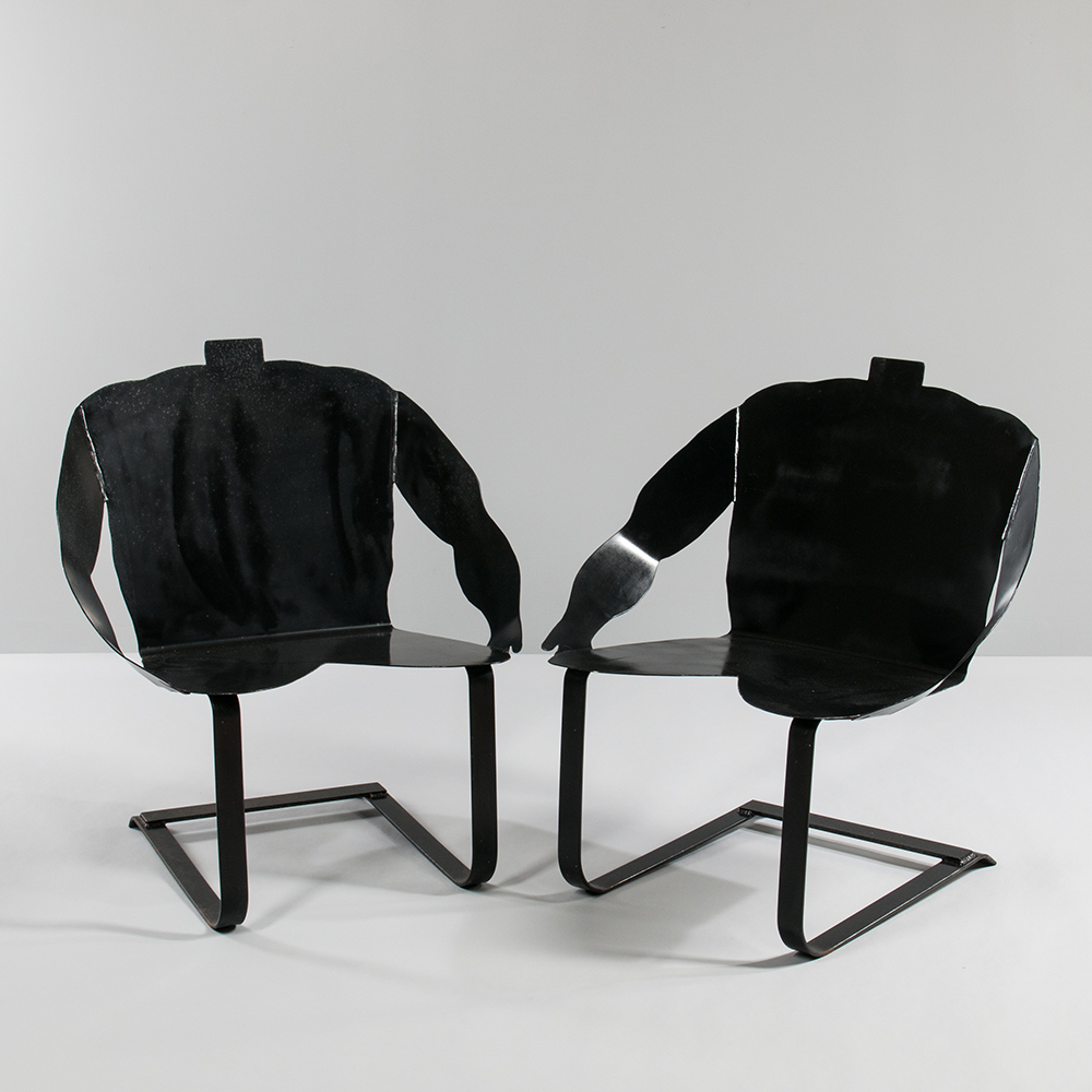 Two Philip Miller Steel "Much Obliged" Rocking Chairs (Estimate: $500-700)