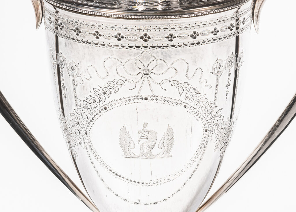 Detail of engravings on a Hester Bateman silver cup