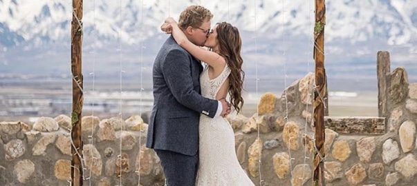 Bride and groom kissing