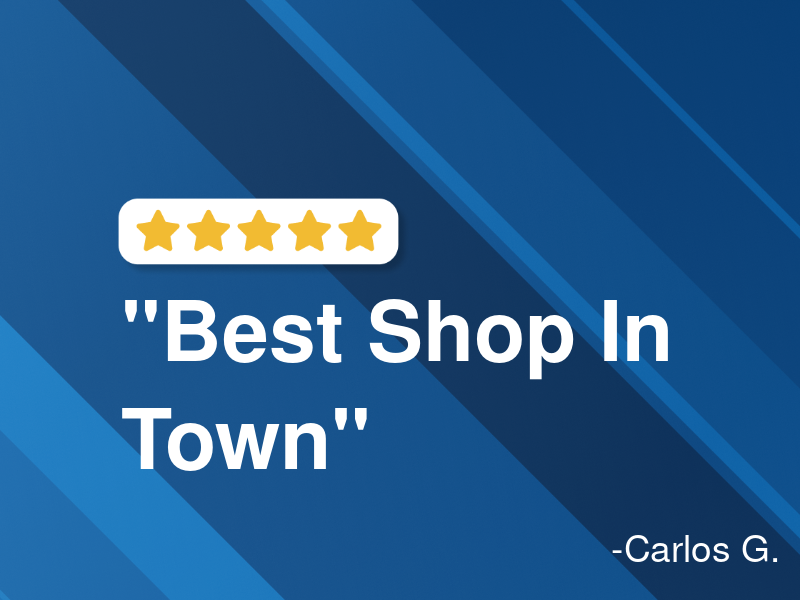 Ed's Automotive Center logo