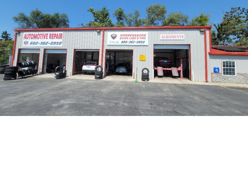 Warrensburg Quick Lube and Tire logo