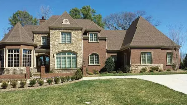 European house plans 106-735 - front exterior, 7,010 sq ft, 4 bed, 4 bath house plans | Monster House Plans