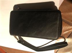 Allison G. verified customer review of Zipped mega storage detachable leather wallet bag iPhone X Case 5.8