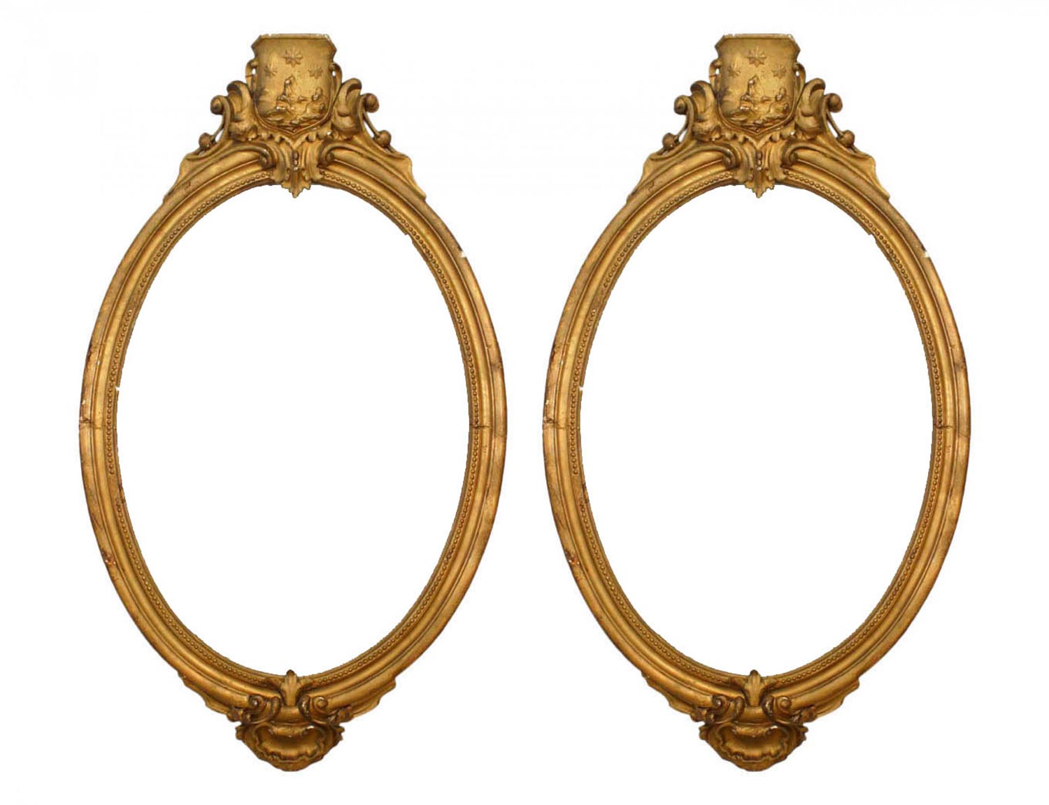 Pair of italian rococo style gilt oval frames