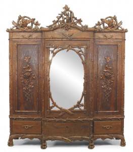 Rustic black forest walnut carved animal head armoire 1