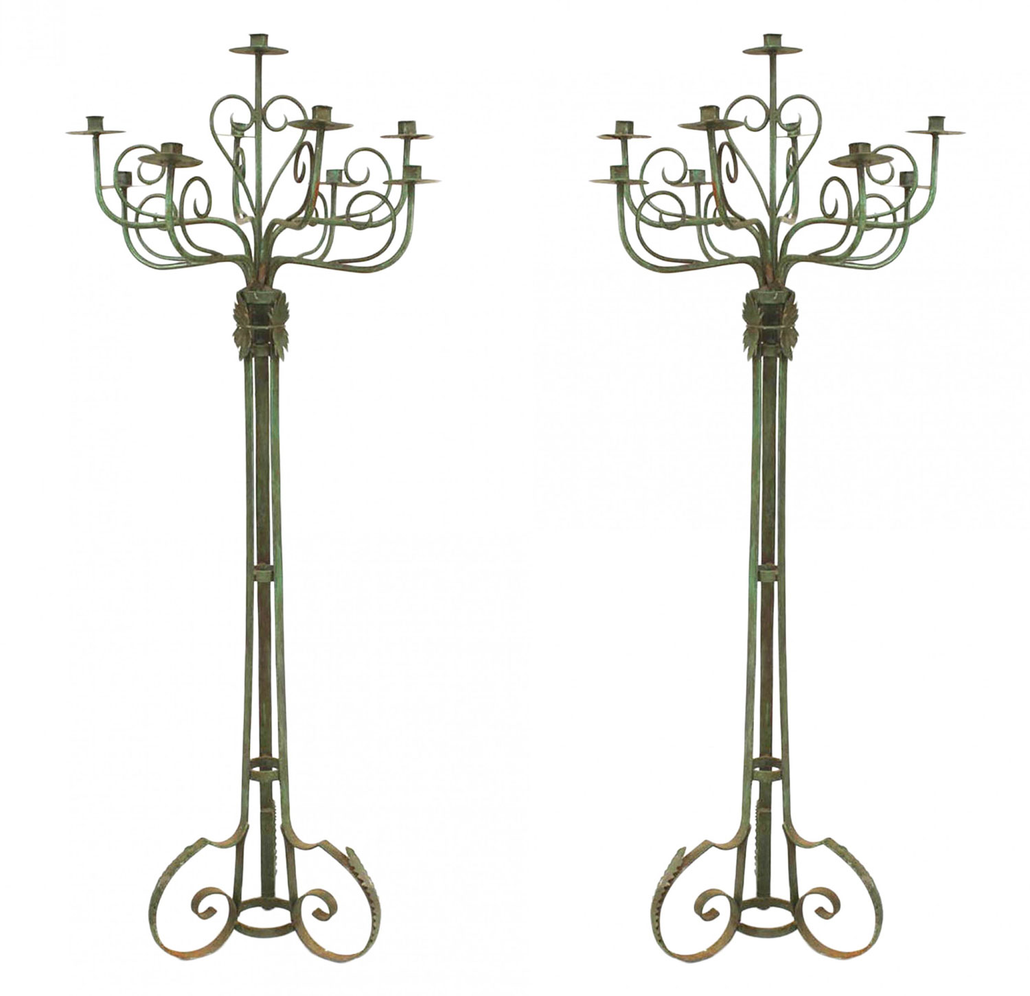 English renaissance patinated wrought iron floor torchieres