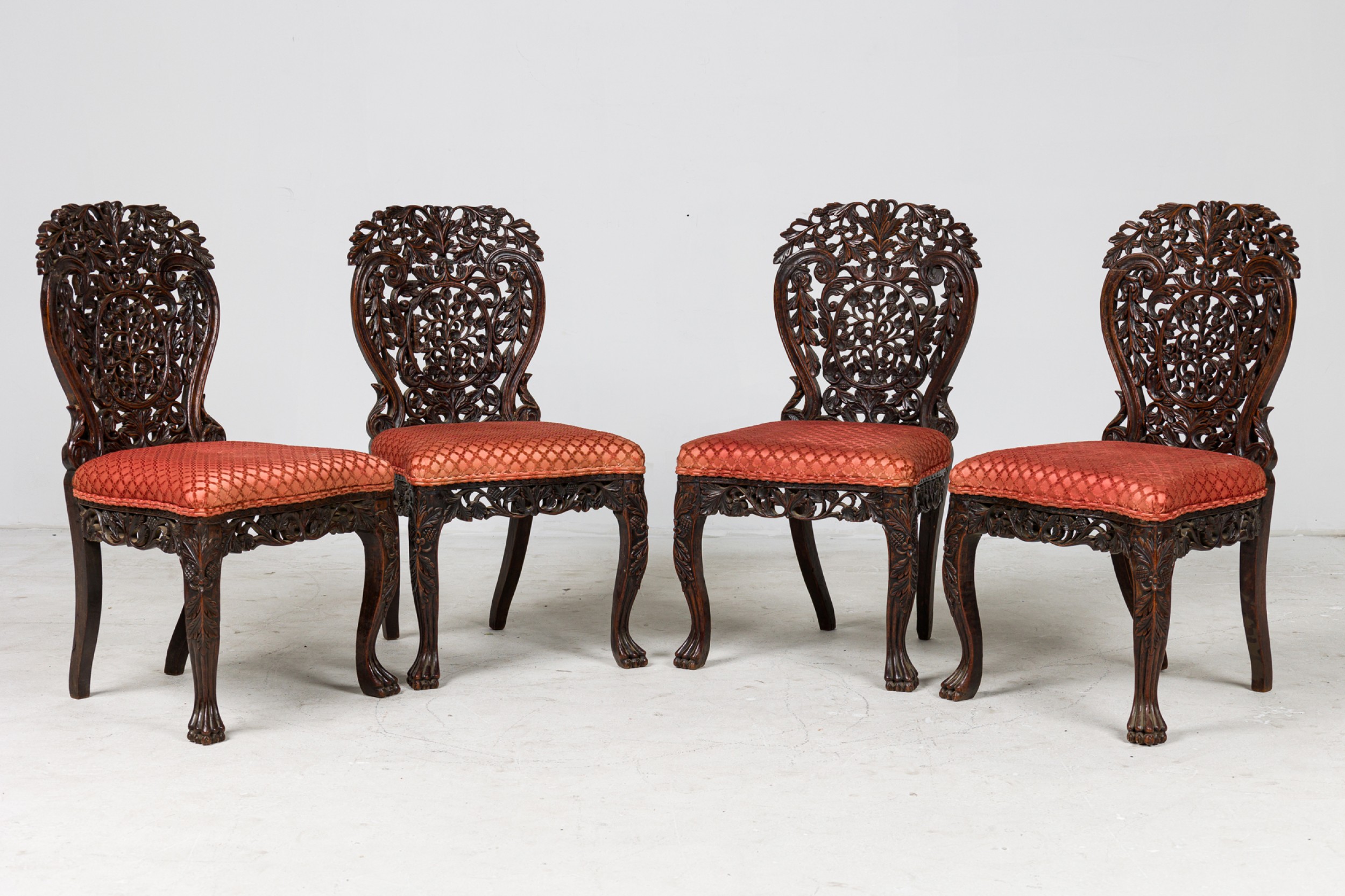 Asian burmese walnut side chairs