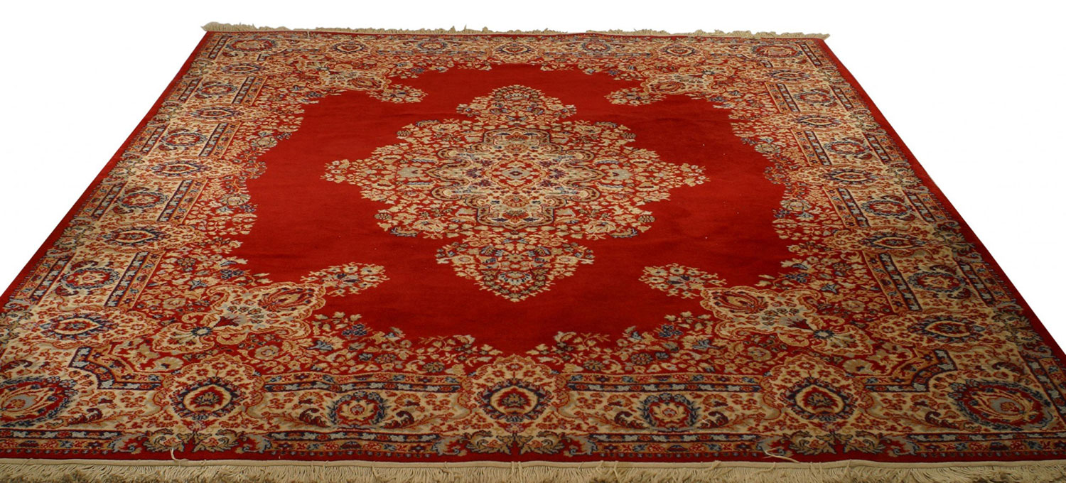 Persian red and beige area rug