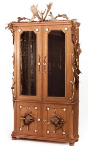 Rustic continental oak and horn bookcase