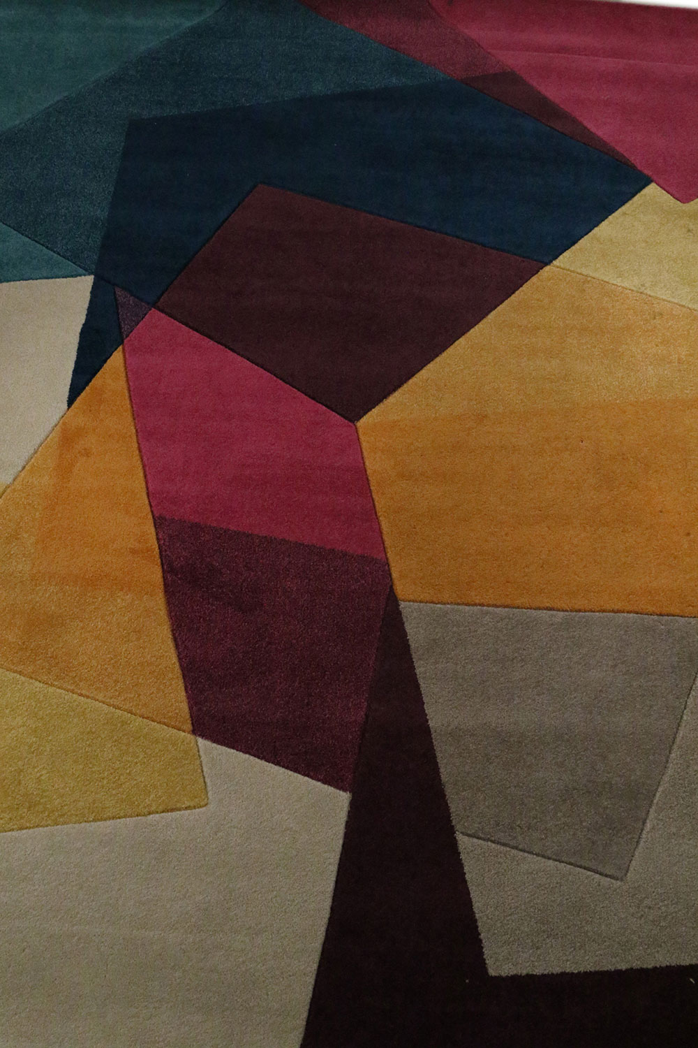 Contemporary multi colored geometric pattern area rug