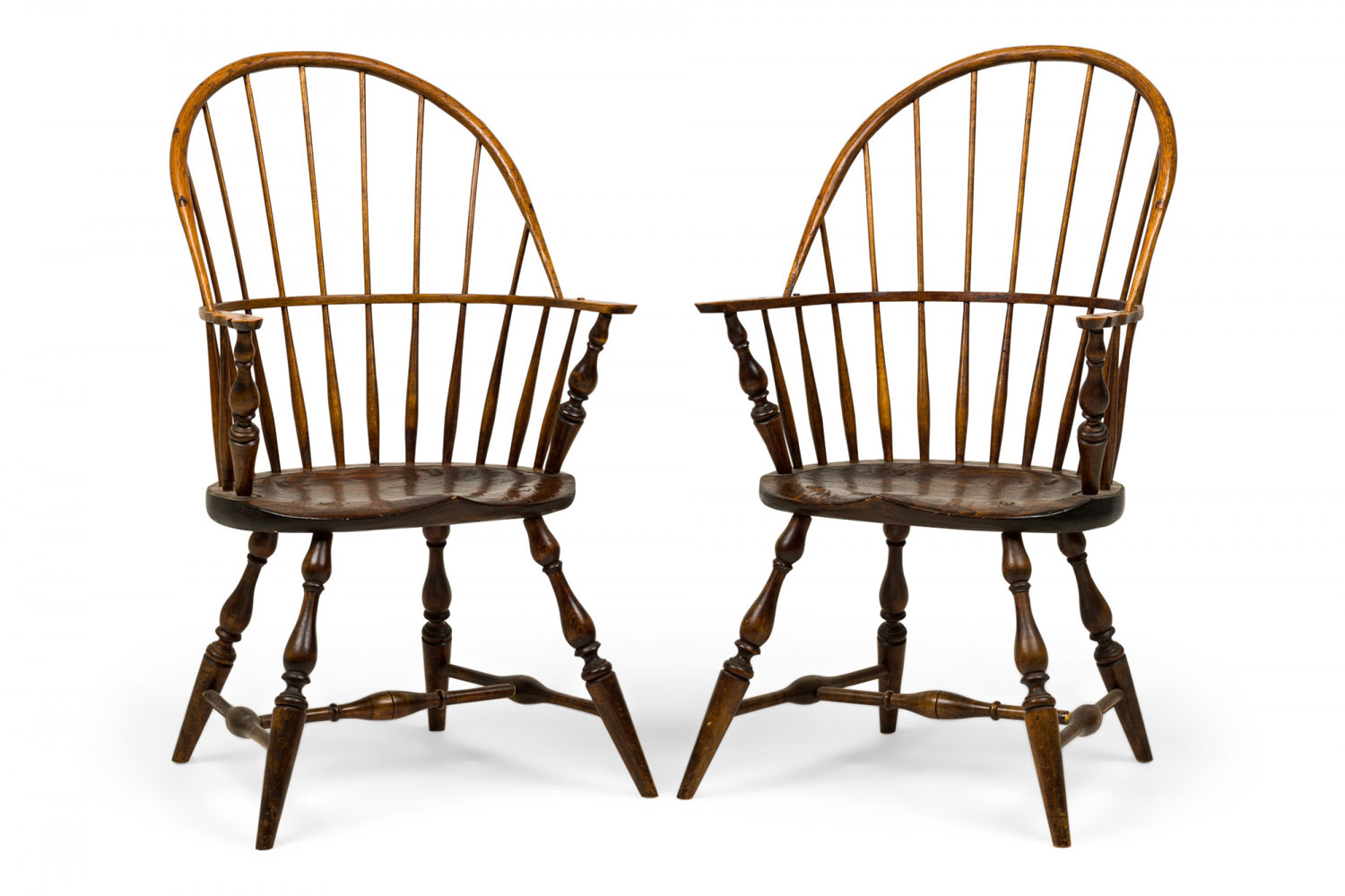 Pair of english country windsor back carved oak dining armchairs