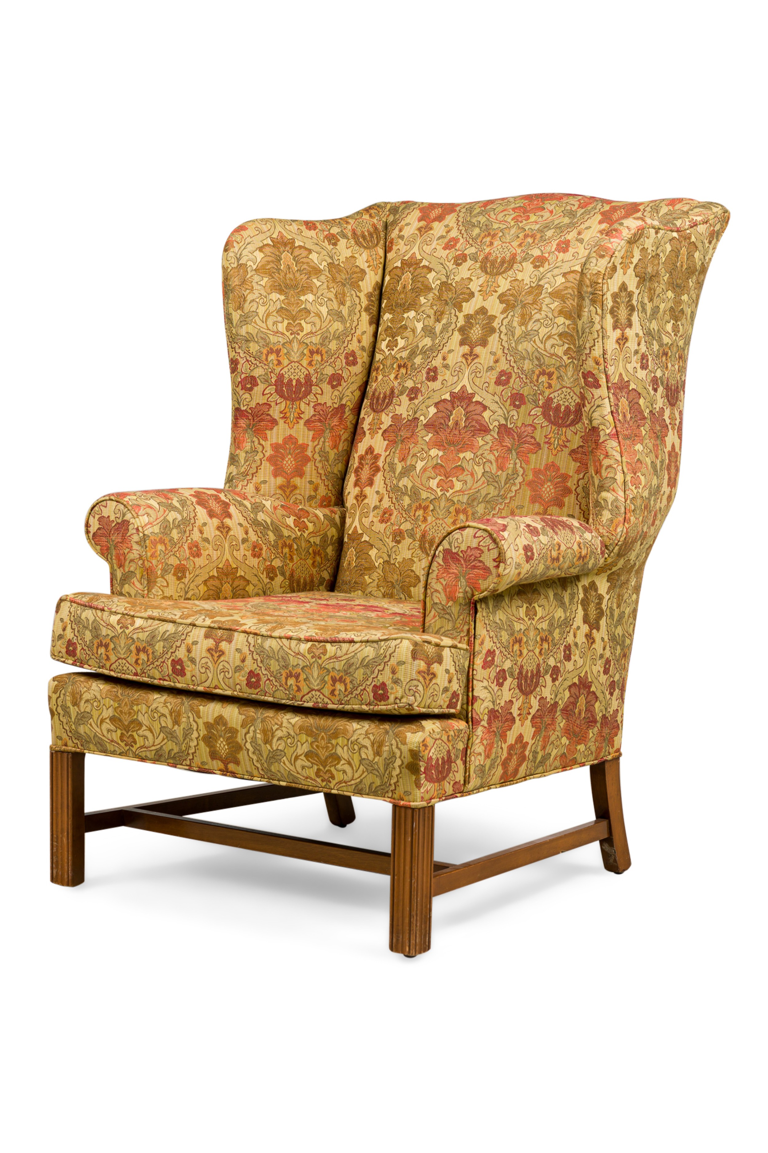 English victorian beige wingback chair with various colored floral pattern 