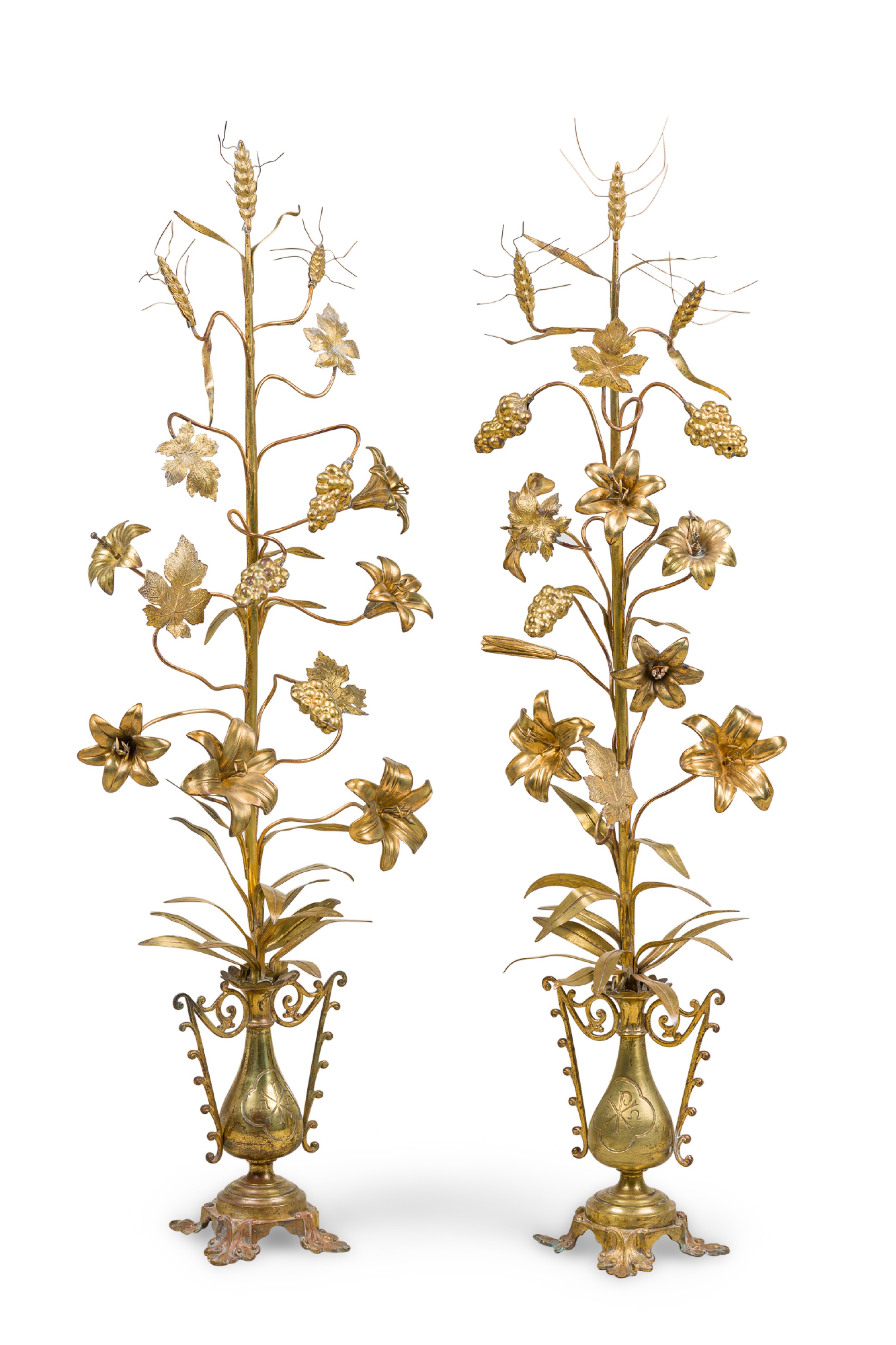 Pair of continental tall vine like brass candelabra 