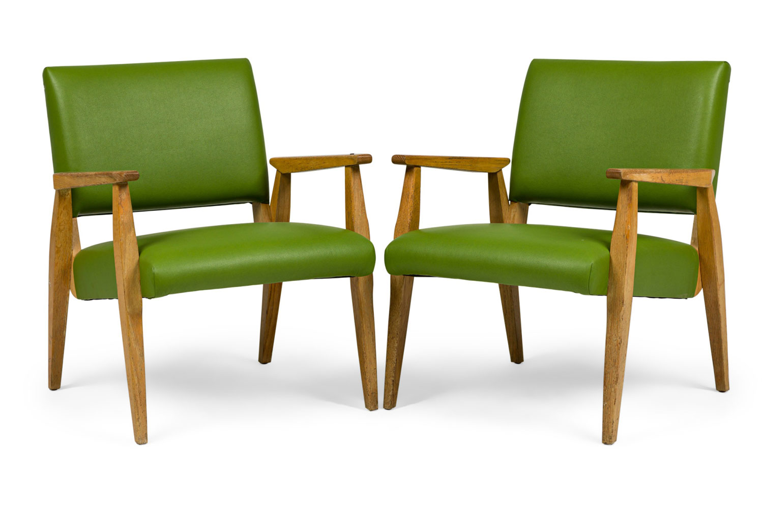 Pair of american mid century green leather arm chairs  