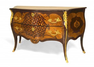 Continental rococo gilt mahogany commode